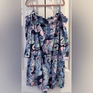 Lilly Pulitzer floral romper in blue and pink.